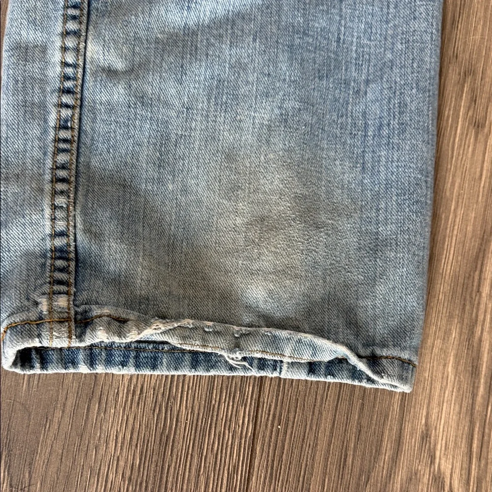 Levi's Light Blue Straight Jeans with Distressed Details